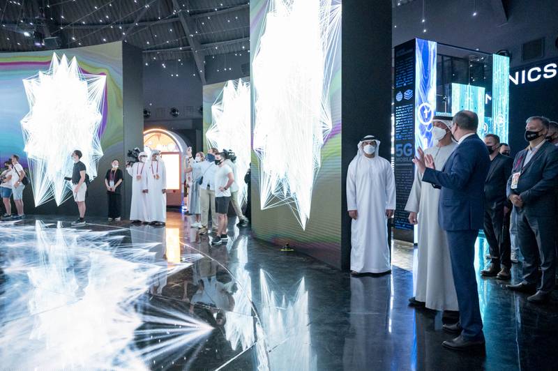 Sheikh Mohamed is shown exhibits inside the Russian Pavilion.