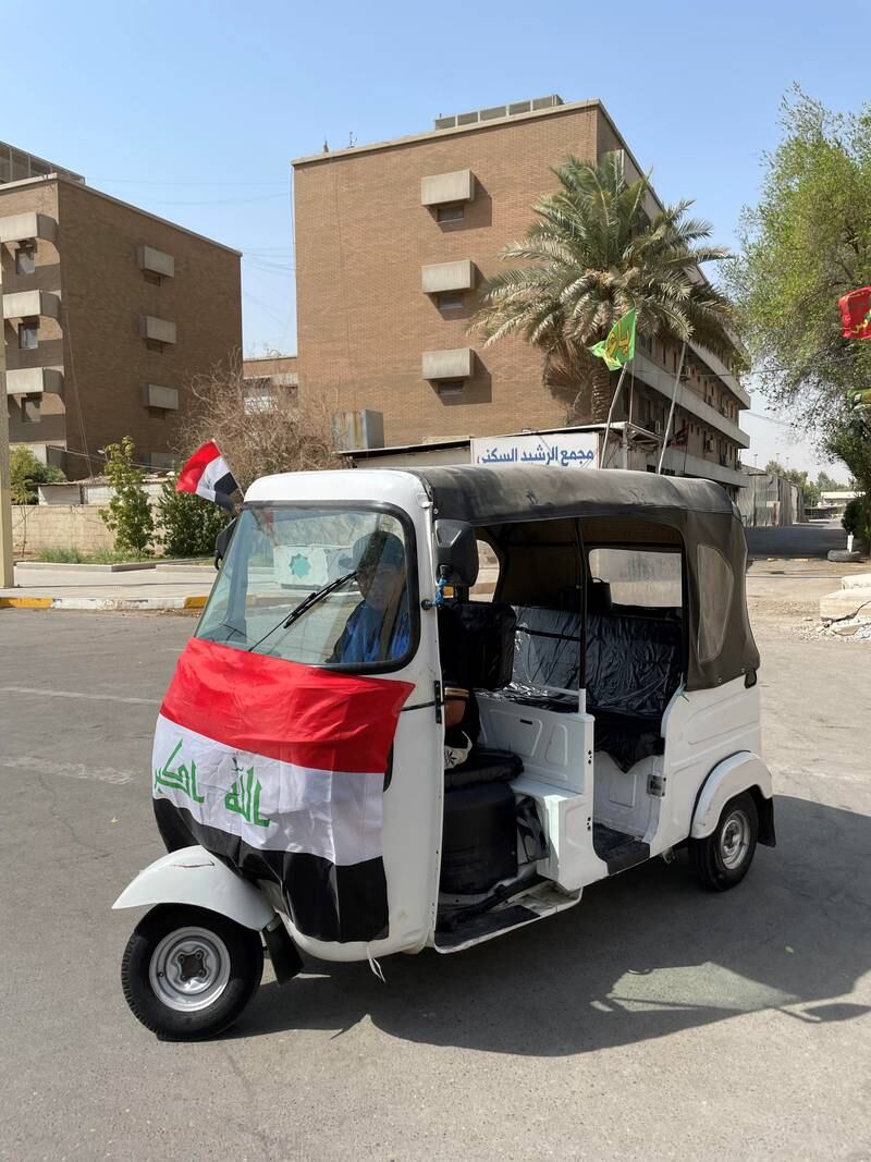 Three-wheeled rickshaws, known as tuk-tuks, shuttle followers of Shiite cleric Moqtada Al Sadr to and from the parliament building. 