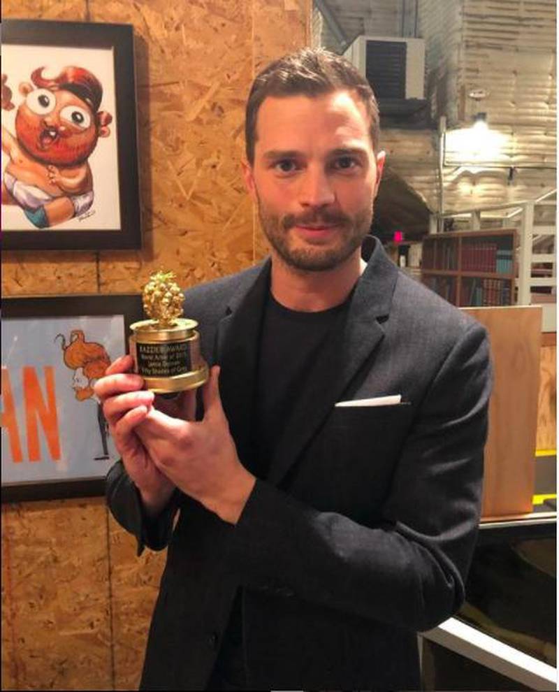 Actor Jamie Dornan with his Worst Actor Razzie for the film 'Fifty Shades of Grey' in 2016. Courtesy Instagram / @the_razzies 