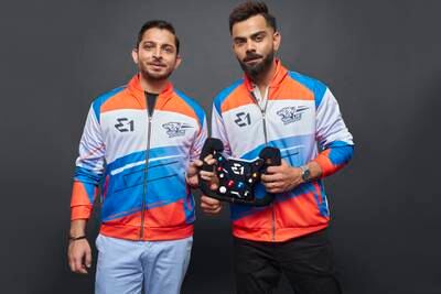 Adi Mishra and India cricket star Virat Kohli, right, will be the guiding forces behind UAE's Team Blue Rising. Photo: Blue Rising