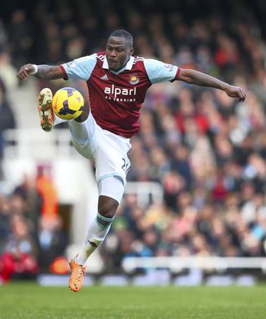 LONDON, ENGLAND - DECEMBER 28: Guy Demel of West Ham contorls the ball during the Barclays Premier League match between West Ham United and West Bromwich Albion at Boleyn Ground on December 28, 2013 in London, England. (Photo by Warren Little/Getty Images)