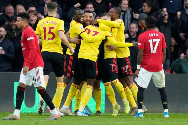 epa08086906 Watford players celebrate after Ismaila Sarr scores during the English Premier League soccer match between Watford and Manchester United at Vicarage Road Stadium, London Britain, 22 December 2019.  EPA/WILL OLIVER EDITORIAL USE ONLY. No use with unauthorized audio, video, data, fixture lists, club/league logos or 'live' services. Online in-match use limited to 120 images, no video emulation. No use in betting, games or single club/league/player publications