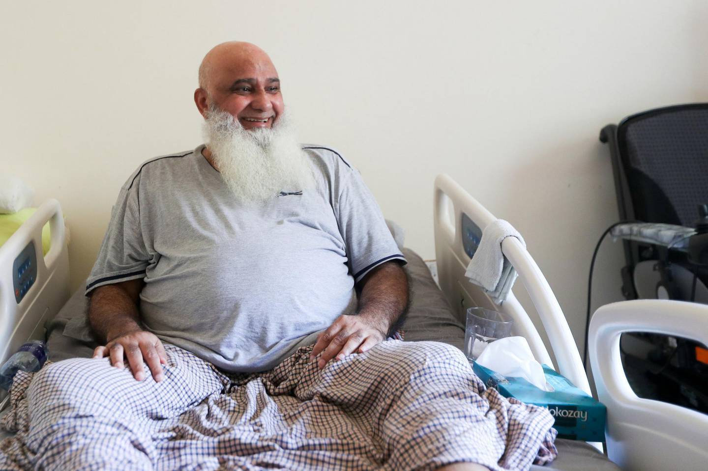 Abu Dhabi, United Arab Emirates. June 17, 2019. Portraits of the retired cricket player, Mohammad Ishaq, in his home. He has been in a wheelchair since 2009, forcing him to retire from the sport. Emily Broad for The National FOR: For Sports Reporter: Paul Radley