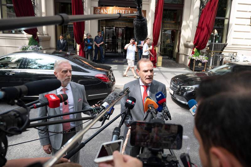 Enrique Mora speaks to the press outside the Grand Hotel Wien where talks were held. AFP