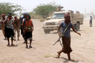 epa07666632 Yemeni government forces backed by the Saudi-led coalition advance during fighting against Houthi rebels on the outskirt of the port city of Hodeidah, Yemen, 22 June 2019. According to reports, the Yemeni government troops have advanced to the southeastern outskirts of the Houthi-controlled city of Hodeidah, which is the key lifeline entry point for the Arab countryâ€™s most food imports and humanitarian aid. The Saudi Arabia has been leading a military coalition to support the exiled Yemeni government against the Houthis since in Yemen March 2015.  EPA/NAJEEB ALMAHBOOBI