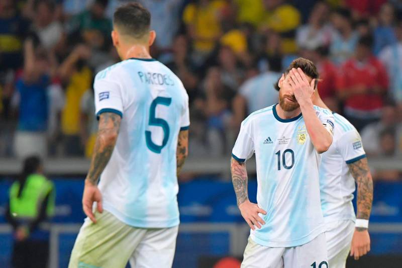 Argentina's Lionel Messi reacts after Brazil goalkeeper Alisson saves his free kick attempt. AFP