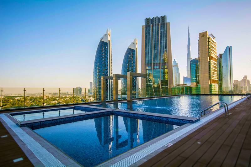 You'll get a view of DIFC from the hotel's open-air pool deck.