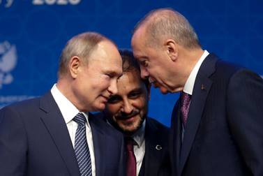 Turkey's President Recep Tayyip Erdogan and Russia's President Vladimir Putin talk during a ceremony in Istanbul for the inauguration of the TurkStream pipeline. AP