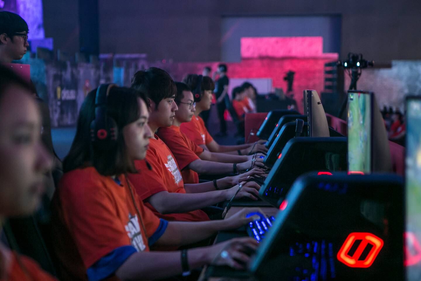 Gamers of the SK Telecom professional video-game team, sponsored by SK Telecom Co., play the League of Legends game during a tournament at the 5GX Game Festival in Goyang, South Korea, on Friday, Aug. 10, 2018. Professional video gaming began in South Korea more than a decade ago, and has given rise to leagues that now pack stadiums and draw hundreds of thousands of eyeballs to Twitch livestreams for tournaments. Photographer: Jean Chung/Bloomberg