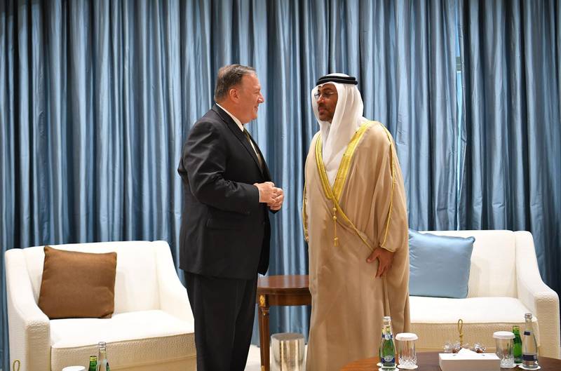 US Secretary of State Mike Pompeo talks to United Arab Emirates Minister of State Ahmed al-Sayegh upon his arrival at al-Bateen Air Base in Abu Dhabi on September 19, 2019. AFP
