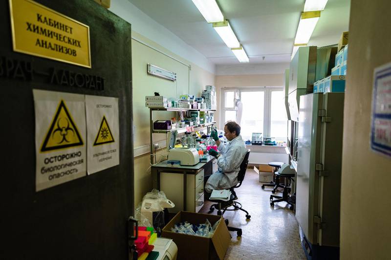 A specialist works in a lab dealing with Covid-19 tests in Moscow, Russia. AFP