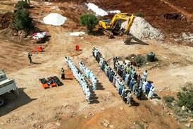 Volunteers hold a funeral prayer for the victims of a powerful storm and heavy rainfall that hit Libya, before burying them at a cemetery, in Derna, Libya September 19, 2023.  REUTERS / Zohra Bensemra