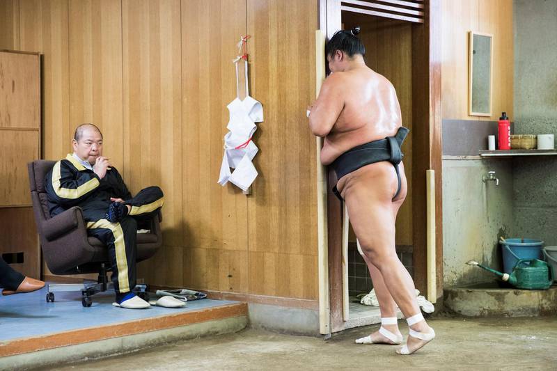 epa06666278 Hokutoumi Nobuyoshi (L) former sumo wrestler, watches a training session of his wrestlers at the Hakkaku stable in Tokyo, Japan, 13 April 2018. Hakkaku stable is a stable of sumo wrestlers which was established in September 1993 by former yokozuna Hokutoumi.  EPA-EFE/PETER KLAUNZER  ATTENTION: This Image is part of a PHOTO SET *** Local Caption *** 54261861