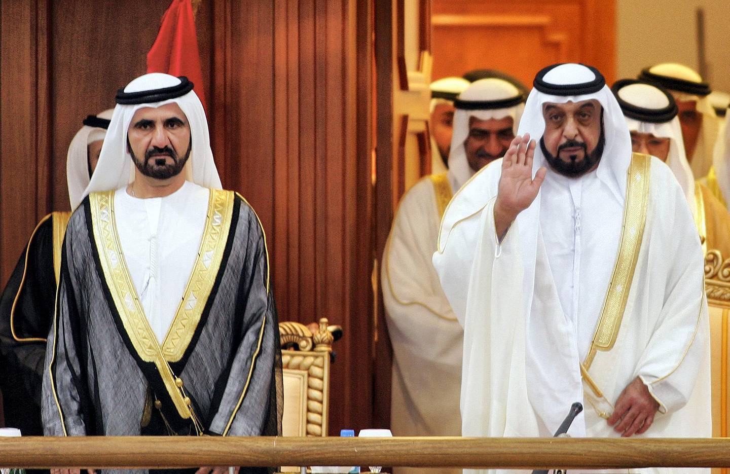 UAE President Sheikh Khalifa Bin Zayed Al-Nahyan (R), and Crown Prince and Dubai ruler Sheikh Mohamed Bin Rashid Al-Maktoum arrive for the inauguration of the National Federal Council 12 February 2007 in Abu Dhabi. The new legstlative body is a consultative body whose members serve for two year terms. AFP PHOTO/KARIM SAHIB (Photo by KARIM SAHIB / AFP)