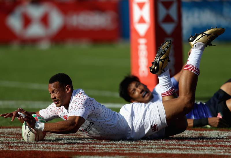 DUBAI, UNITED ARAB EMIRATES - NOVEMBER 30:  Dan Norton of England scores a try during the match between England and Japan on day two of the Emirates Dubai Rugby Sevens - HSBC World Rugby Sevens Series at The Sevens Stadium on November 30, 2018 in Dubai, United Arab Emirates.  (Photo by Francois Nel/Getty Images)