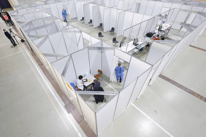 Inoculation booths at the reopened vaccination centre in Messe Dresden, Germany. AP