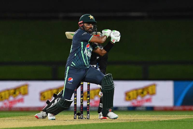 Pakistan's Babar Azam plays a shot during the second cricket match between New Zealand and Pakistan in the Twenty20 tri-series at Hagley Oval in Christchurch on October 8, 2022.  (Photo by Sanka Vidanagama  /  AFP)