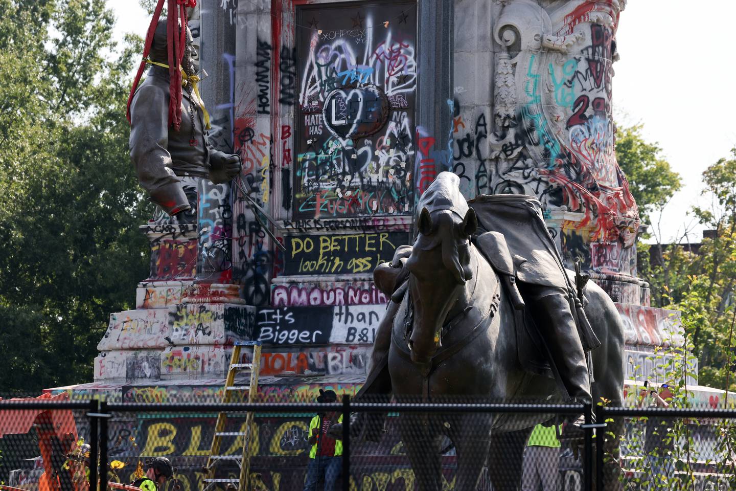 The pedestal has been covered by constantly evolving, colourful graffiti. Reuters