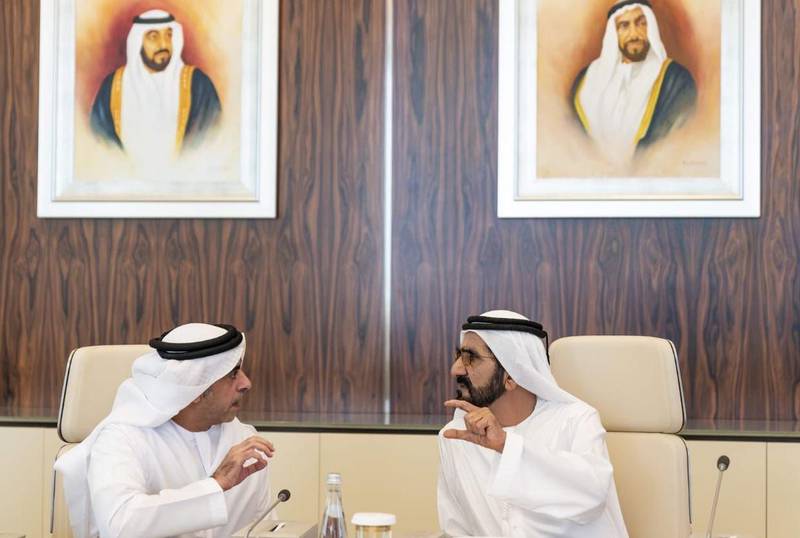 Sheikh Mohammed bin Rashid and Sheikh Saif bin Zayed speak at the Cabinet meeting on Sunday.