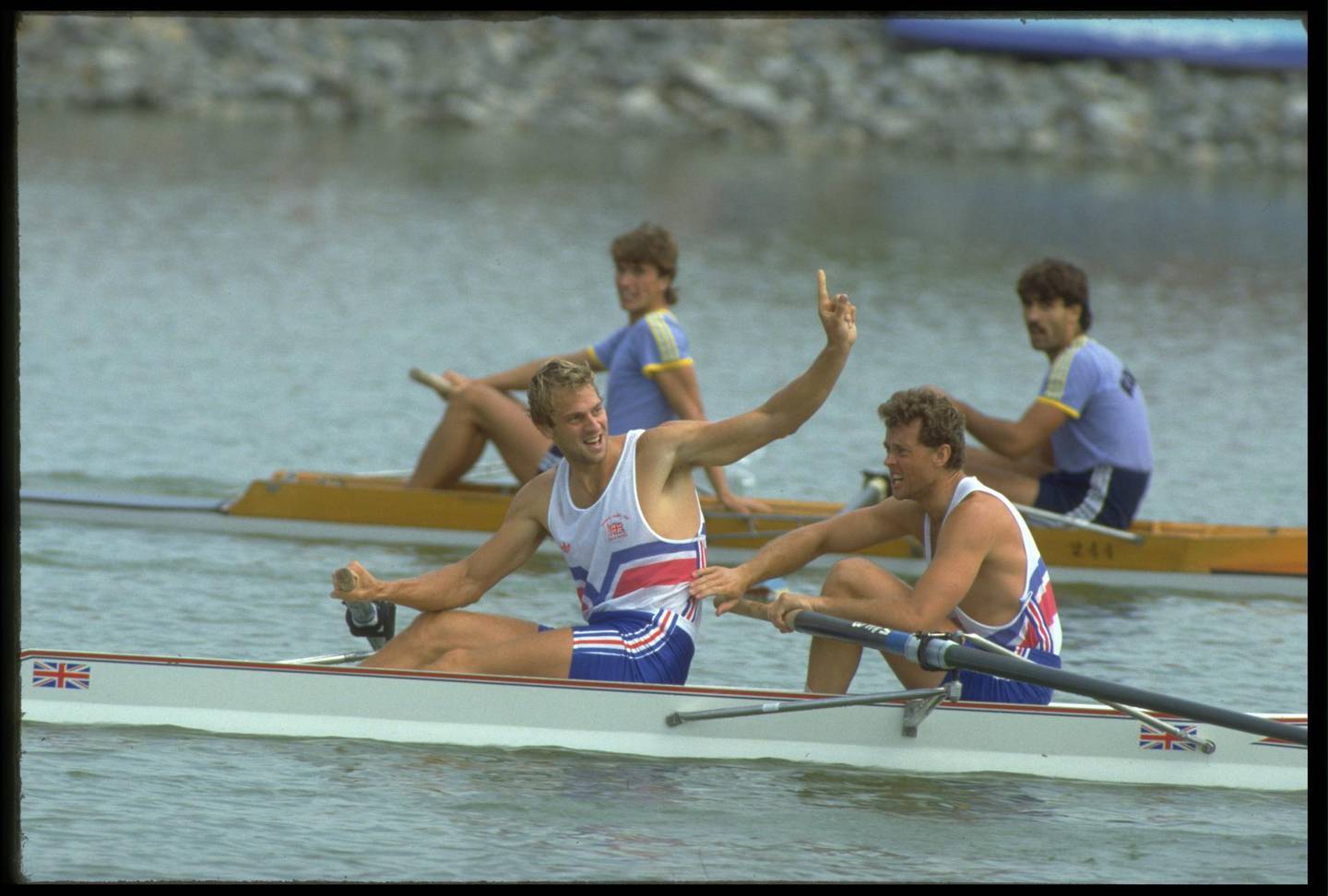 24 SEP 1988:  STEVEN REDGRAVE (LEFT) AND ANDREW HOLMES OF GREAT BRITAIN CELEBRATE AFTER WINNING THE COXLESS PAIRS ROWING EVENT AT THE 1988 SEOUL OLYMPICS.  Mandatory Credit:  ALLSPORT/SIMON BRUTY