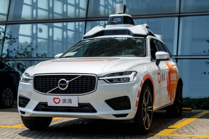 Self-driving cars developed by Didi, a Chinese company providing app-based transportation services, is captured going through a road test in Jiading district, Shanghai, China, 30 June 2020. Reuters