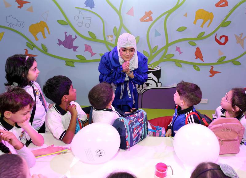 Sharjah, United Arab Emirates - April 18, 2019: Hajar Yousef tells stories in arabic at Sharjah children's reading festival. Thursday the 18th of April 2019. Expo Centre, Sharjah. Chris Whiteoak / The National
