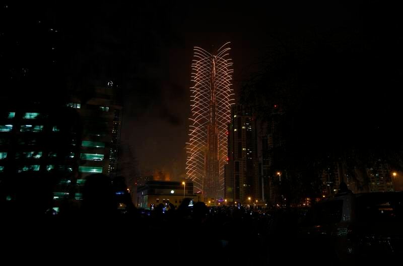 Dubai, United Arab Emirates - January 1, 2015.  Fireworks at Burj Khalifa to usher the New Year.  ( jeffrey E Biteng / The National ) *** Local Caption ***  JB010115-Fireworks02.jpg