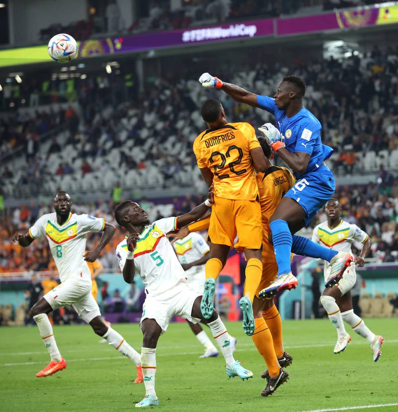 Senegal keeper Edouard Mendy punches the ball clear. Getty 