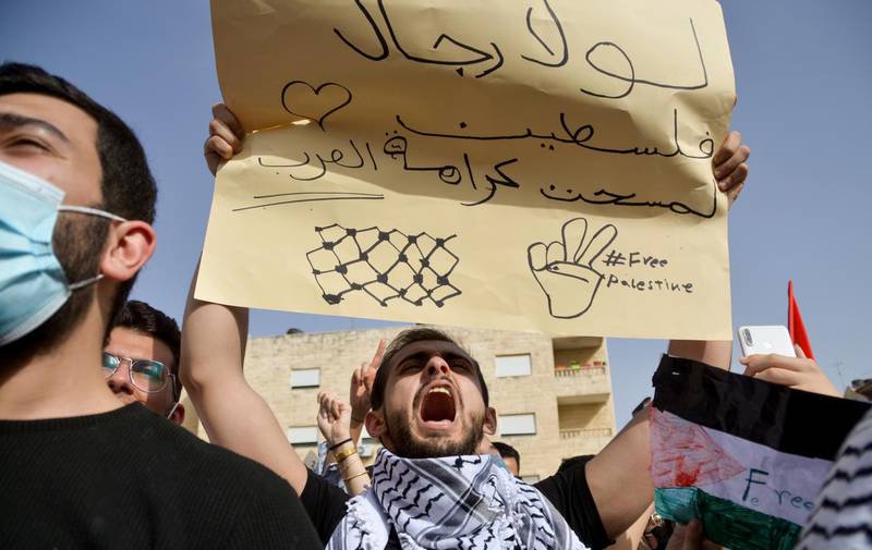 People protest near the Israeli embassy in Amman, Jordan. Reuters