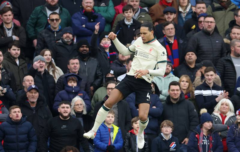 Liverpool's Virgil van Dijk celebrates scoring their first goal. Reuters