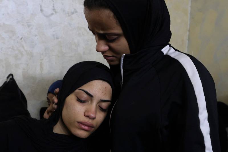 Relatives mourn the death of Palestinian teenager Mahdi Hashash, who died of shrapnel wounds during an Israeli raid. AFP