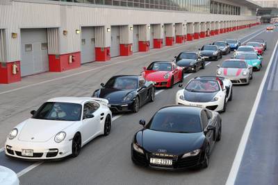 DUBAI, UNITED ARAB EMIRATES, August 31 – 2018 :- Members and Guests of the Ninth Degree supercars club lined up to drive their cars during the Ninth Degree supercars club meet held at Dubai Autodrome in Dubai. ( Pawan Singh / The National )  For Motoring. Story by Adam Workman