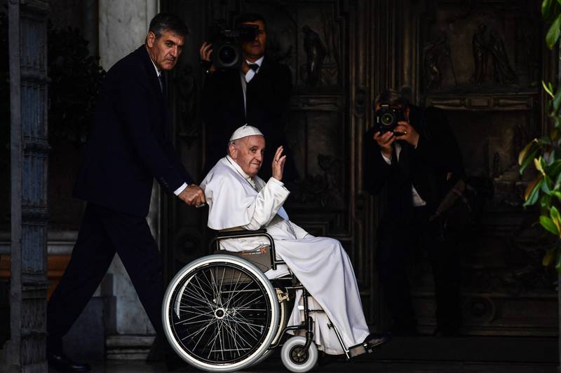 Pope Francis, pictured in a wheelchair following knee treatment, has postponed a visit to the Democratic Republic of Congo and South Sudan. AFP