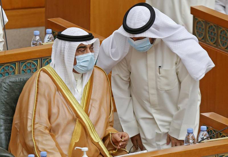Kuwaiti Prime Minister Sheikh Sabah and Kuwaiti Finance Minister Barrak Al Shaitan during a parliament session at Kuwait's national assembly. AFP