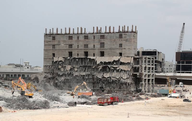 Demolition work under way at the Dubai Pearl on Monday. Pawan Singh / The National