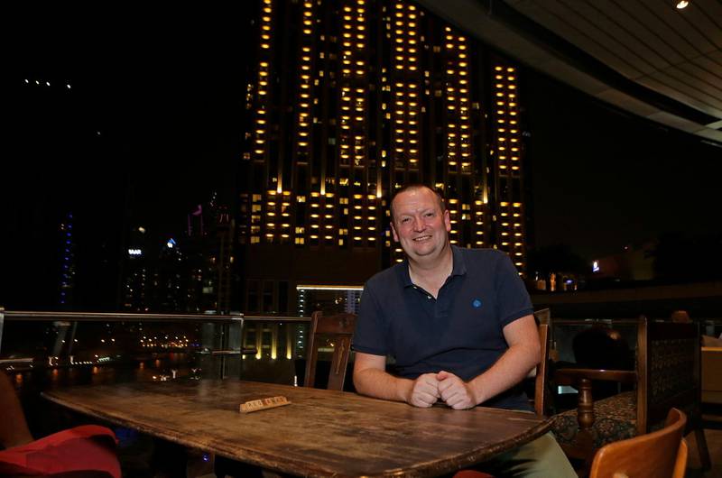 Dubai, United Arab Emirates - October 13, 2016.  Chris Battle ( 46 years old from UK and Commercial Manager ) spearhead the Property Hub Dubai meet up at The Scene.  ( Jeffrey E Biteng / The National )  Editor's Note;  ID 19421 *** Local Caption ***  JB131016-Chris05.jpg