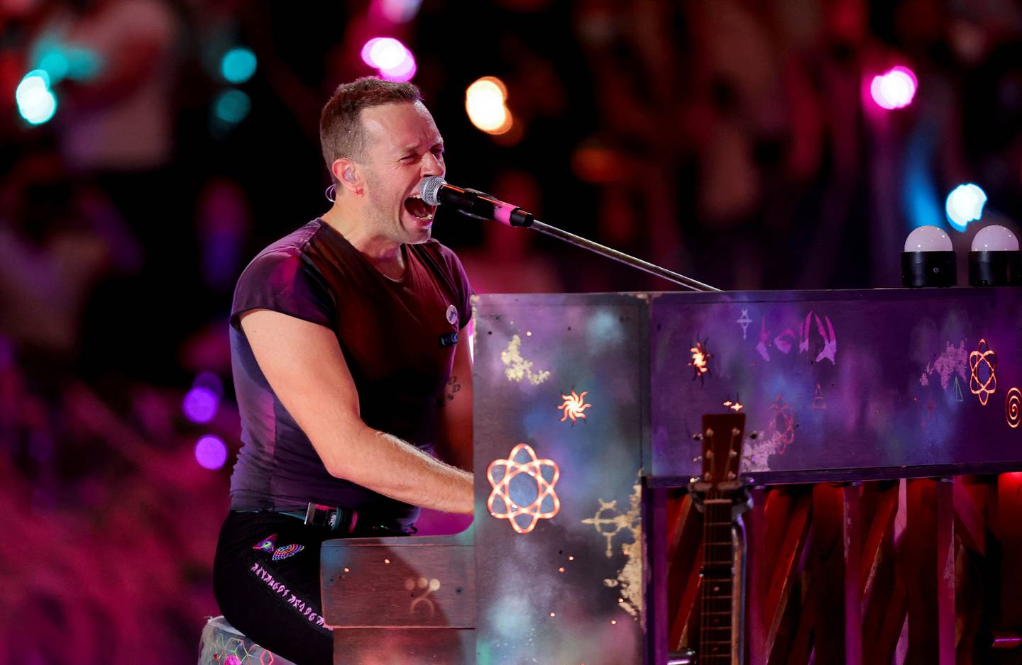 Chris Martin of the band Coldplay performs at Expo 2020 Dubai. Reuters