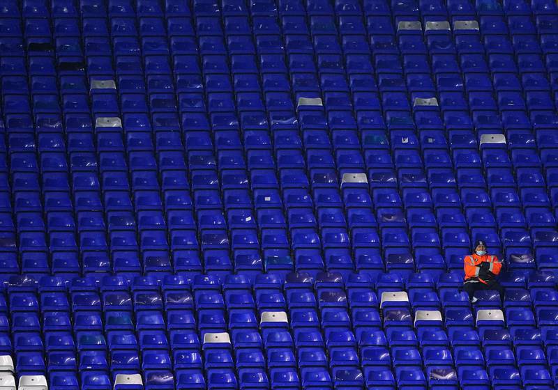 A steward sits in the empty stands during the Sky Bet Championship match at the St. Andrew's Trillion Trophy Stadium, Birmingham. PA Wire