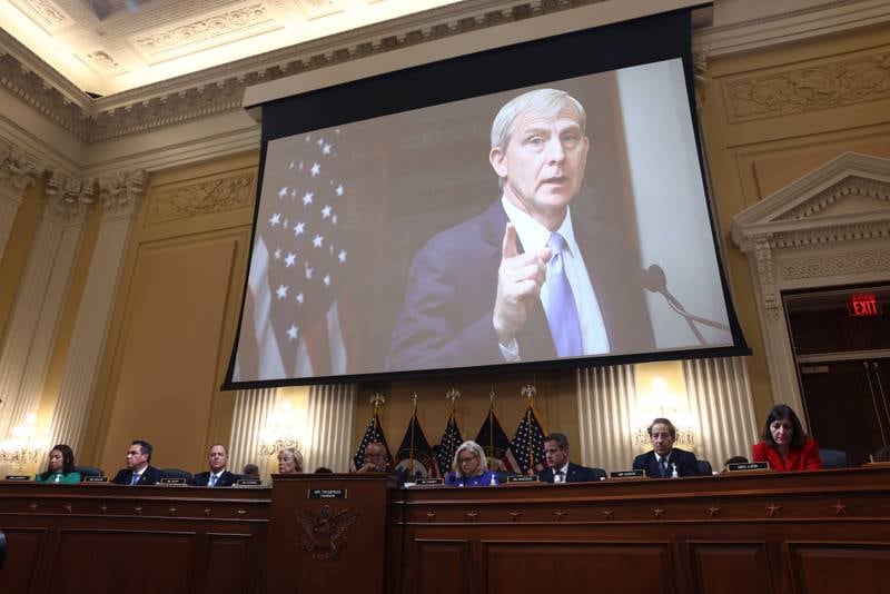 An image of Greg Jacob, who served as chief counsel to former US vice president Mike Pence, appears on a screen as Republican party representative Liz Cheney delivers her opening remarks. EPA