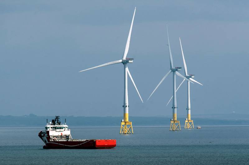 Britain plans to expand both wind power generation and oil and gas production offshore. AFP