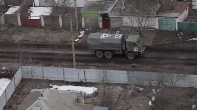 A Russian Armed Forces vehicle with "Z" and triangle markings during the Ukraine invasion at an unspecified location in a screengrab from social media. Reuters