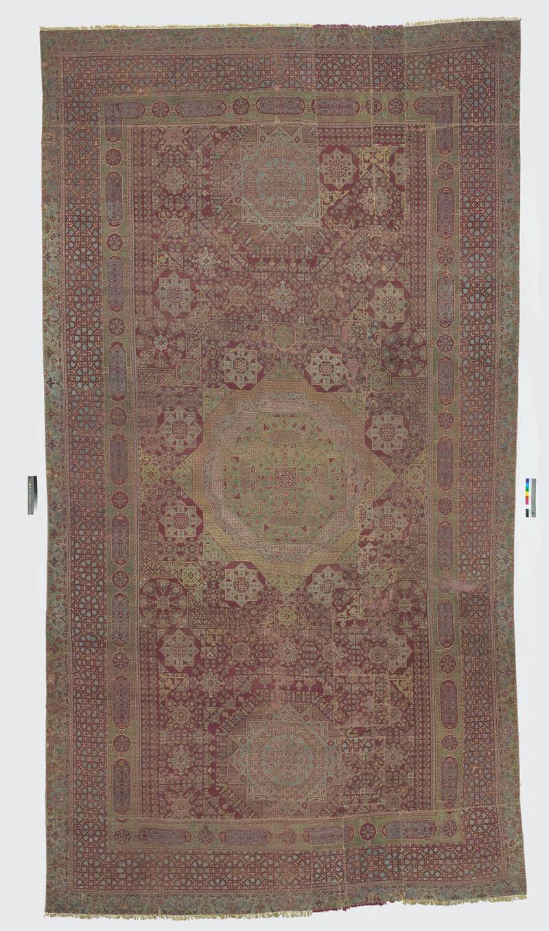 Three Medallion Mamluk Carpet, Egypt, Cairo, 1450-1500, wool. Courtesy: Louvre Abu Dhabi. Photo credit: Department of Culture and Tourism – Abu Dhabi/Hervé Lewandowski