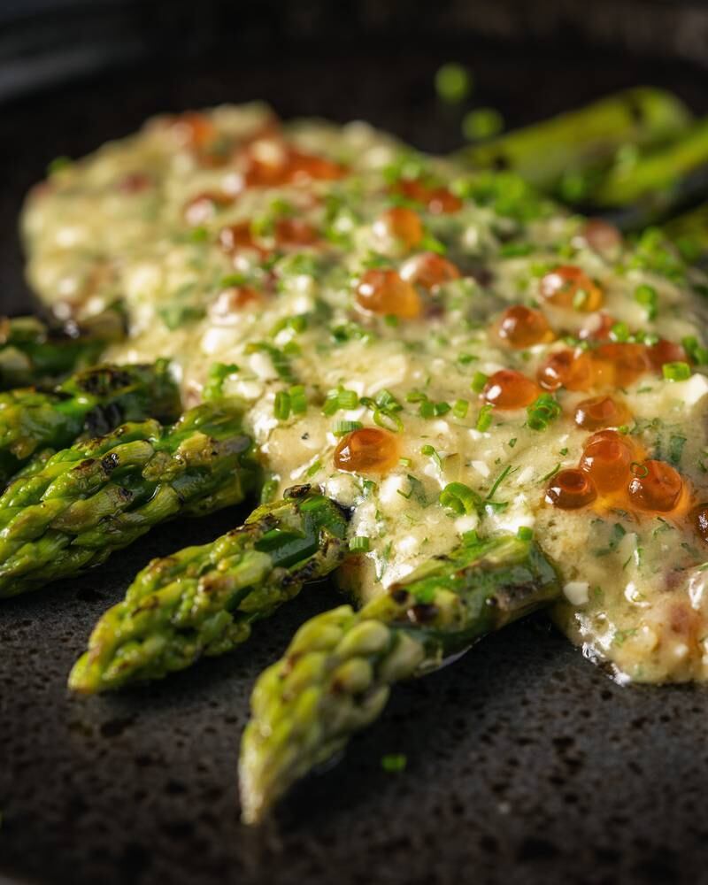 Grilled asparagus with salmon roe gribiche, Dh95