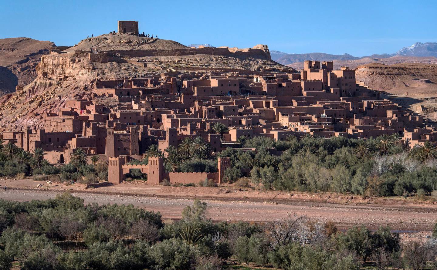 This picture taken on January 27, 2020 shows a view of the Kasbah (ancient fortress) of Ait-Ben-Haddou, where scenes depicting the fictional city of Yunkai from the hit HBO television series "Game of Thrones" were filmed, about 32 kilometres northwest of the city of Ouarzazate south of Morocco's High Atlas mountains. - Millions worldwide may have seen the desert fortress in the hit fantasy series "Game of Thrones", but few know they can visit Morocco's kasbah Ait-Ben-Haddou -- where locals hope more fans might visit. The fortified city at the foot of the majestic Atlas mountains enchanted global audiences in the epic HBO series and also served as a dusty backdrop in Ridley Scott's swords-and-sandals epic "Gladiator". (Photo by FADEL SENNA / AFP)