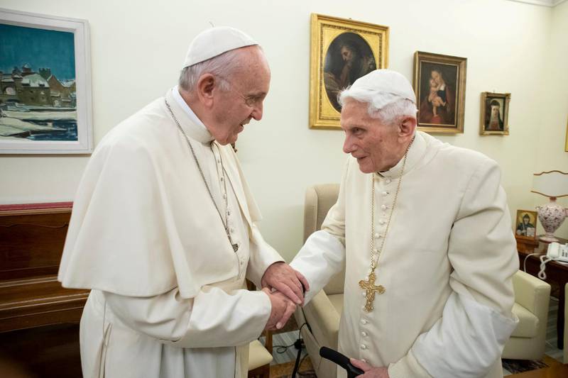 FILE PHOTO: Pope Francis visits his predecessor, Pope Emeritus Benedict XVI, at the Mater Ecclesiae Monastery in Vatican, December 21, 2018. Picture taken December 21, 2018.  Vatican Media/Handout via REUTERS    ATTENTION EDITORS - THIS IMAGE WAS PROVIDED BY A THIRD PARTY/File Photo