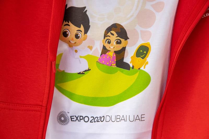 Mascots Rashid, Latifa and Opti on an Expo 2020 T-shirt.