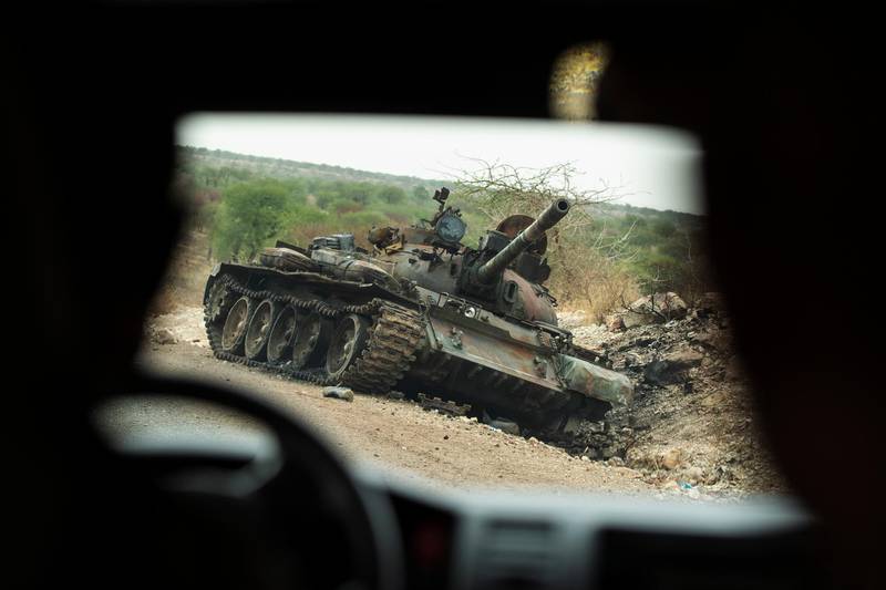 A destroyed tank is seen by the side of the road south of Humera, in an area of western Tigray annexed by the Amhara region during the ongoing conflict, in Ethiopia, Saturday, May 1, 2021. Ethiopia faces a growing crisis of ethnic nationalism that some fear could tear Africa's second most populous country apart, six months after the government launched a military operation in the Tigray region to capture its fugitive leaders. (AP Photo/Ben Curtis)