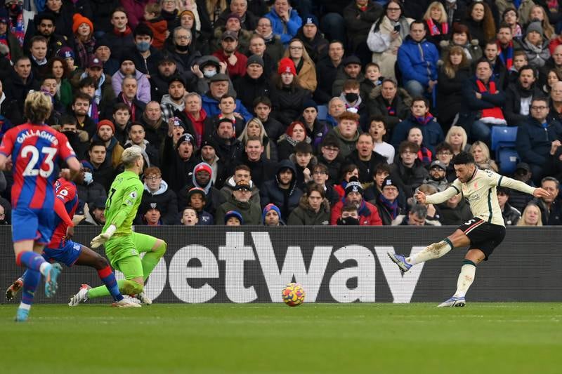 Alex Oxlade-Chamberlain fires home Liverpool's third. Getty