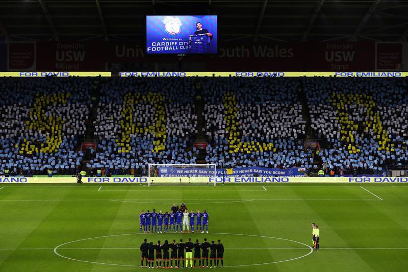 Players, fans and officials take part in a minute of silence in tribute to Emiliano Sala and pilot David Ibbotson prior to the Premier League match between Cardiff City and Bournemouth. Getty