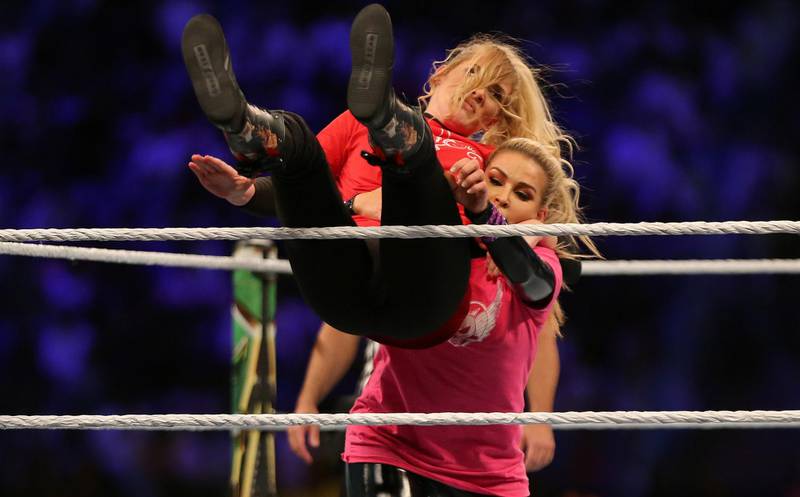 Natalya in action with Evans. Reuters